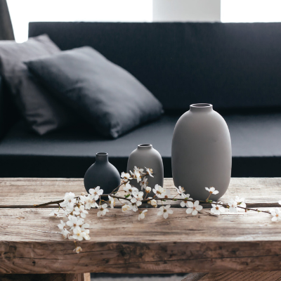 coffee table decor of grey clay pots