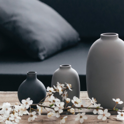 coffee table decor of grey clay pots