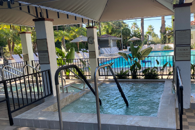 Swimming pool with spa