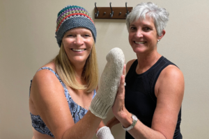 two women high fiving