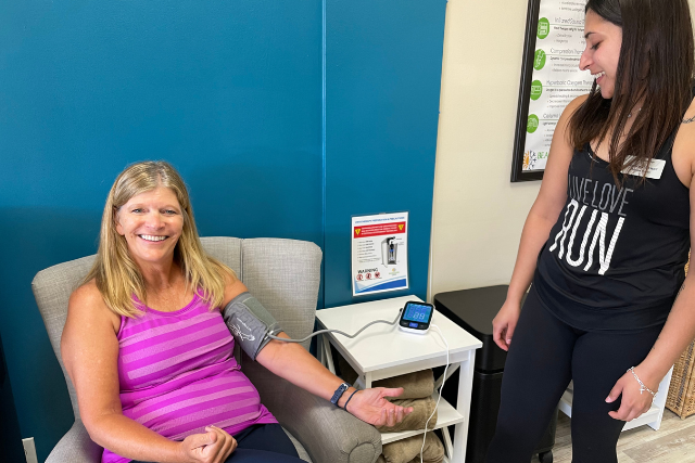 woman gets her blood pressure tested
