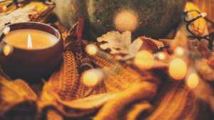 candles and Thanksgiving table decor