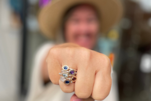 hand with multiple rings on one finger