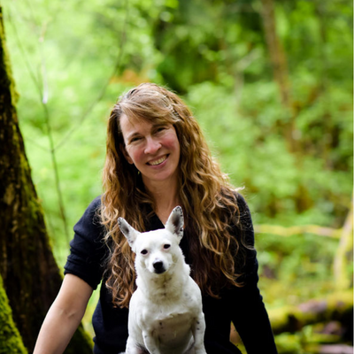 Wendy Woldenberg with her dog in nature