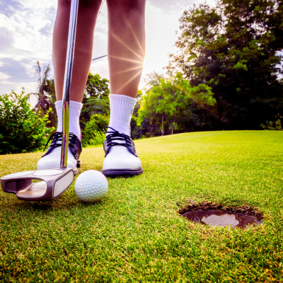Female golfer at tee
