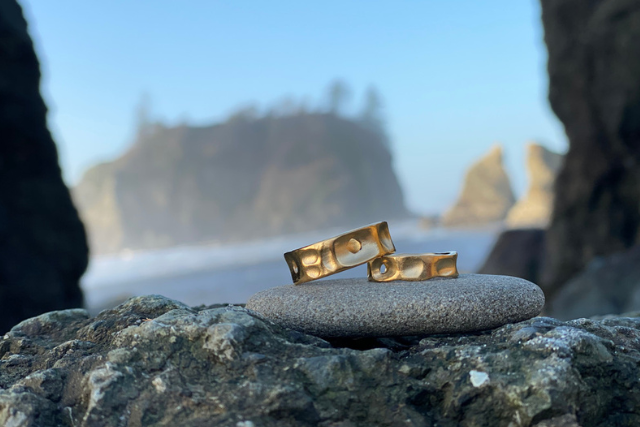 WEND jewelry rings displayed on nature rocks