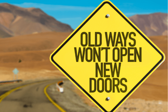 Road sign old ways won't open new doors